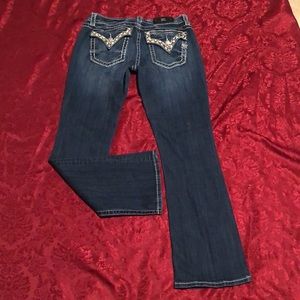 Miss Me Sz 31 dark wash with factory distressing , lots of brown/white bling!!